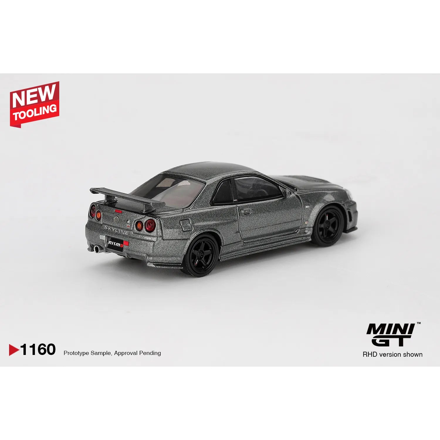 Mini GT 1:64 Nissan Skyline GT-R R34 Dark Metal Gray NISMO CRS 1999 die-cast model car.