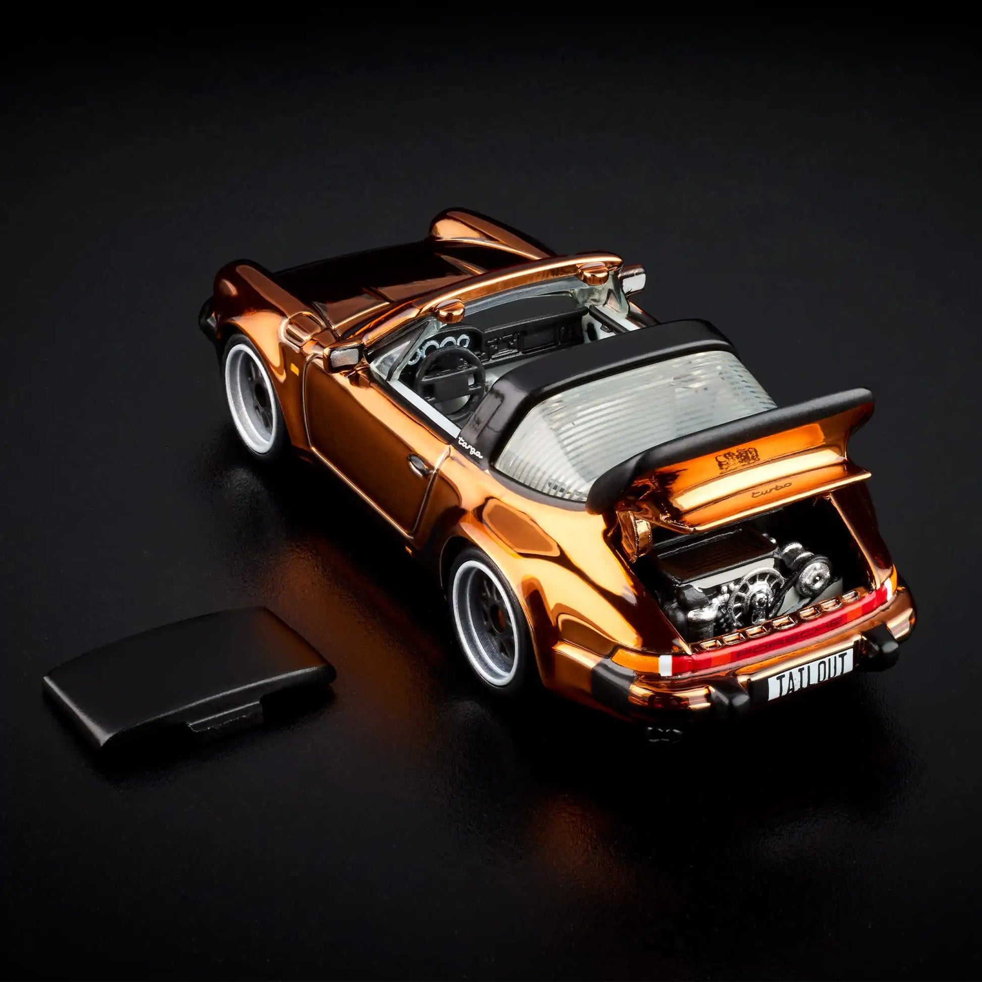 Hot Wheels RLC Exclusive 1988 Porsche 911 Targa Turbo in Spectraflame Brown with removable targa top, opening rear engine cover and Real Riders Fifteen52 Outlaw wheels.