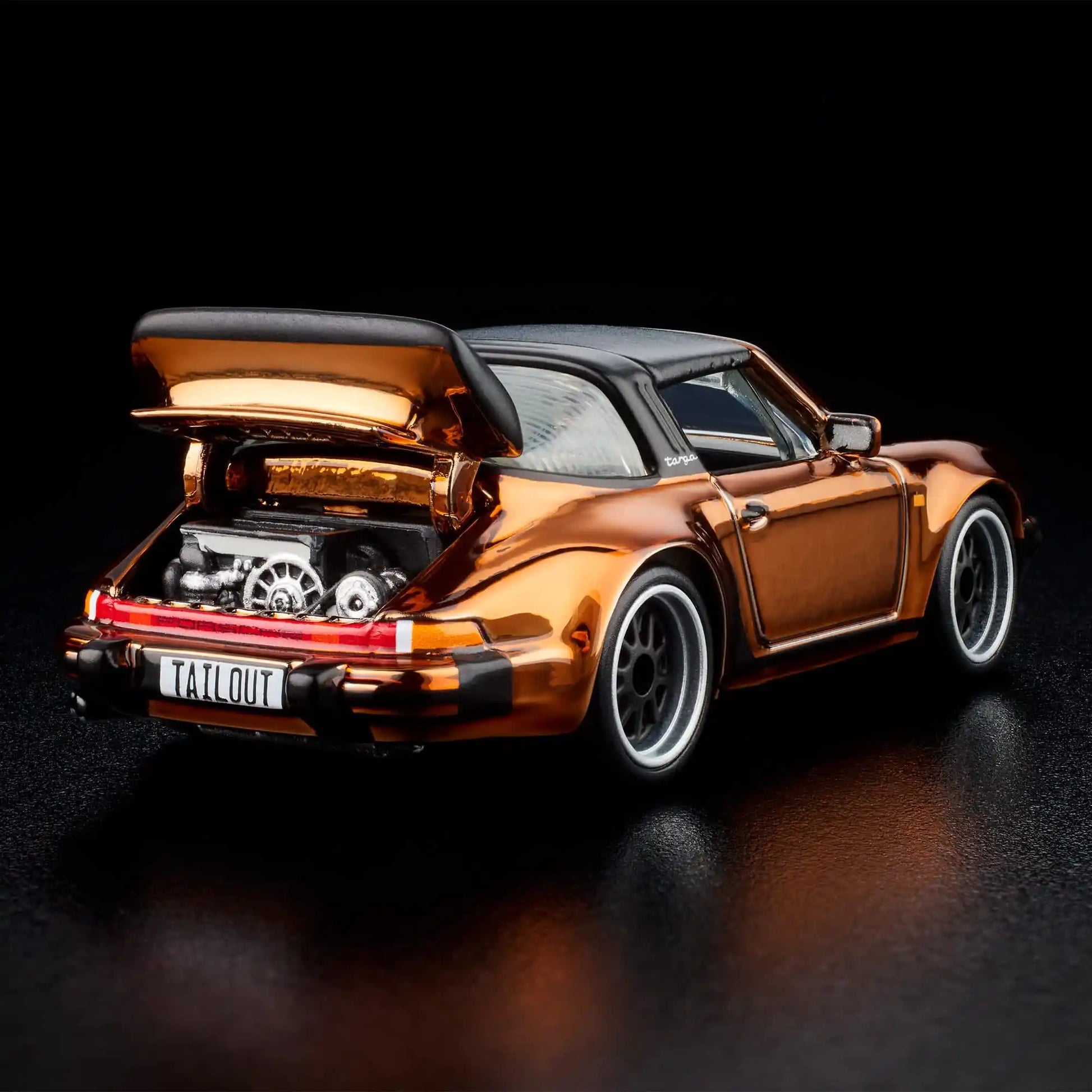 Hot Wheels RLC Exclusive 1988 Porsche 911 Targa Turbo in Spectraflame Brown with removable targa top, opening rear engine cover and Real Riders Fifteen52 Outlaw wheels.