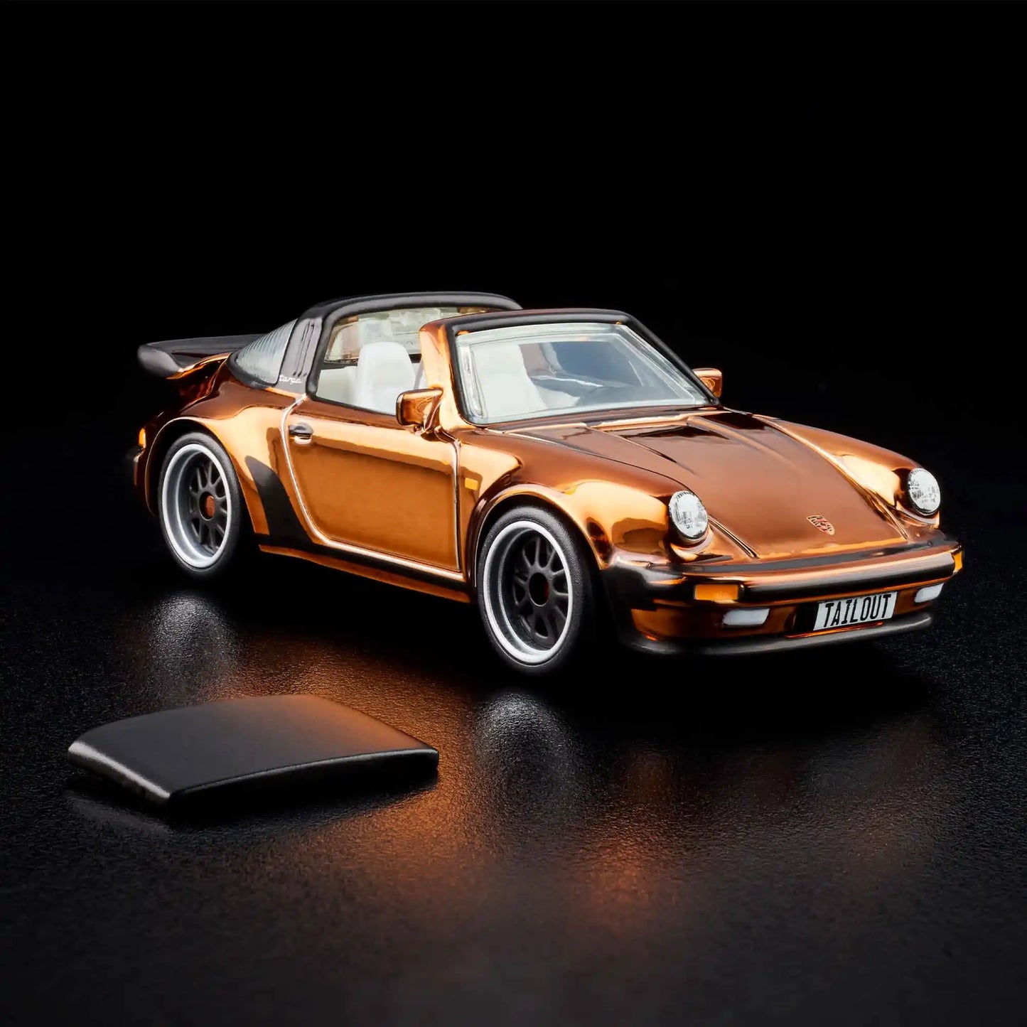 Hot Wheels RLC Exclusive 1988 Porsche 911 Targa Turbo in Spectraflame Brown with removable targa top, opening rear engine cover and Real Riders Fifteen52 Outlaw wheels.