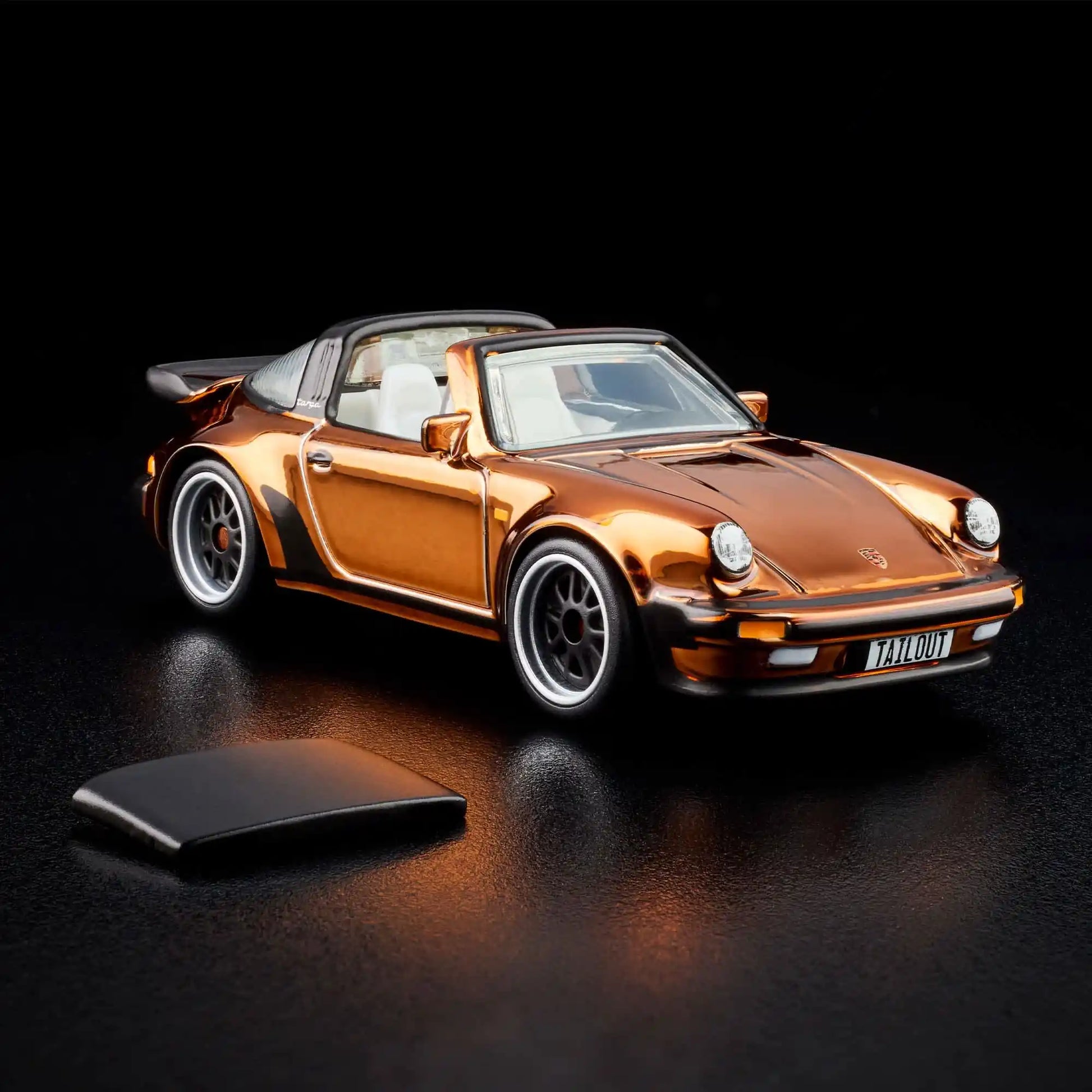 Hot Wheels RLC Exclusive 1988 Porsche 911 Targa Turbo in Spectraflame Brown with removable targa top, opening rear engine cover and Real Riders Fifteen52 Outlaw wheels.