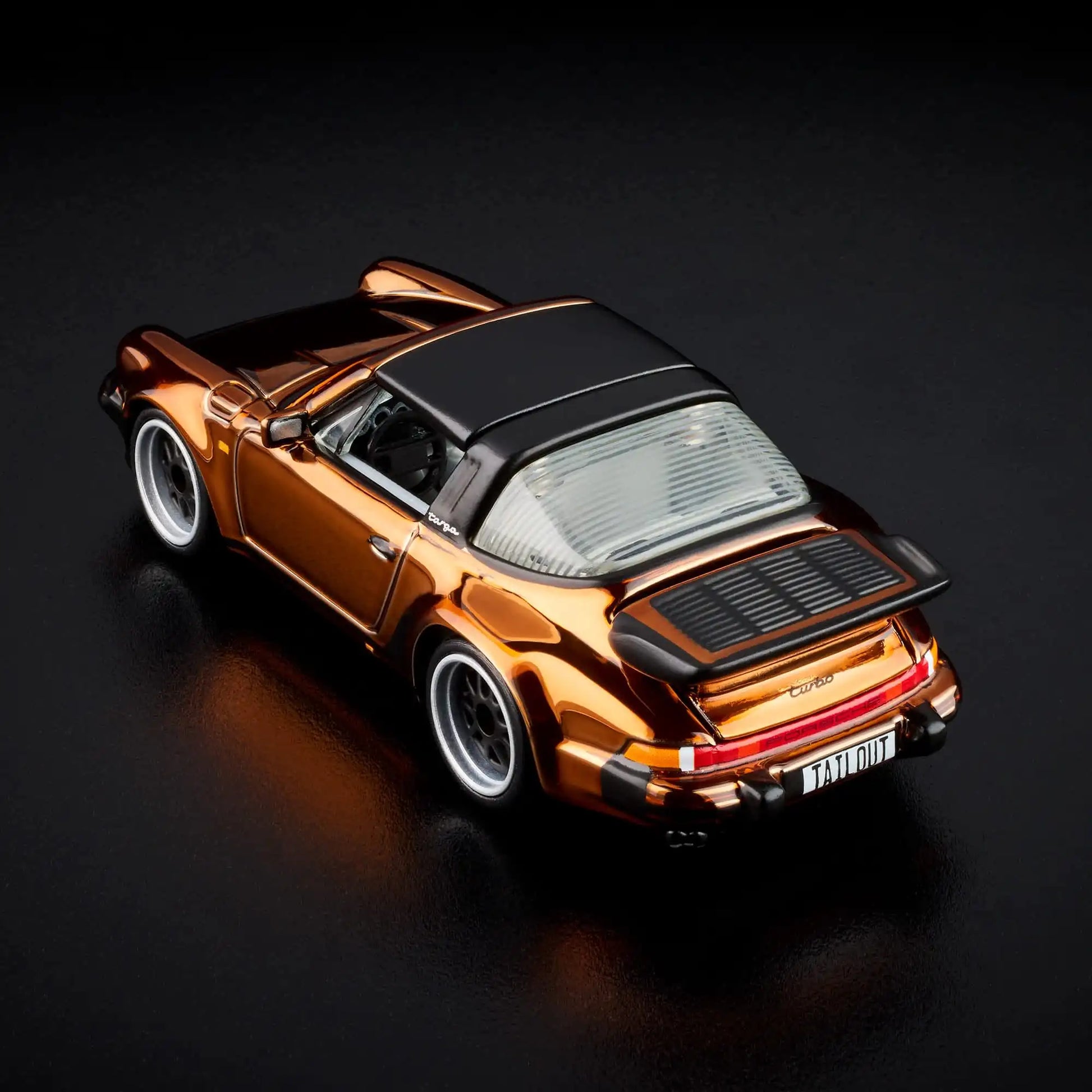 Hot Wheels RLC Exclusive 1988 Porsche 911 Targa Turbo in Spectraflame Brown with removable targa top, opening rear engine cover and Real Riders Fifteen52 Outlaw wheels.