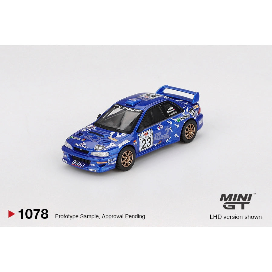 Mini GT 1:64 Subaru Impreza WRC99 #23 from the 2000 Acropolis Rally featuring rally-style livery, authentic WRC detailing, and rugged die-cast finish