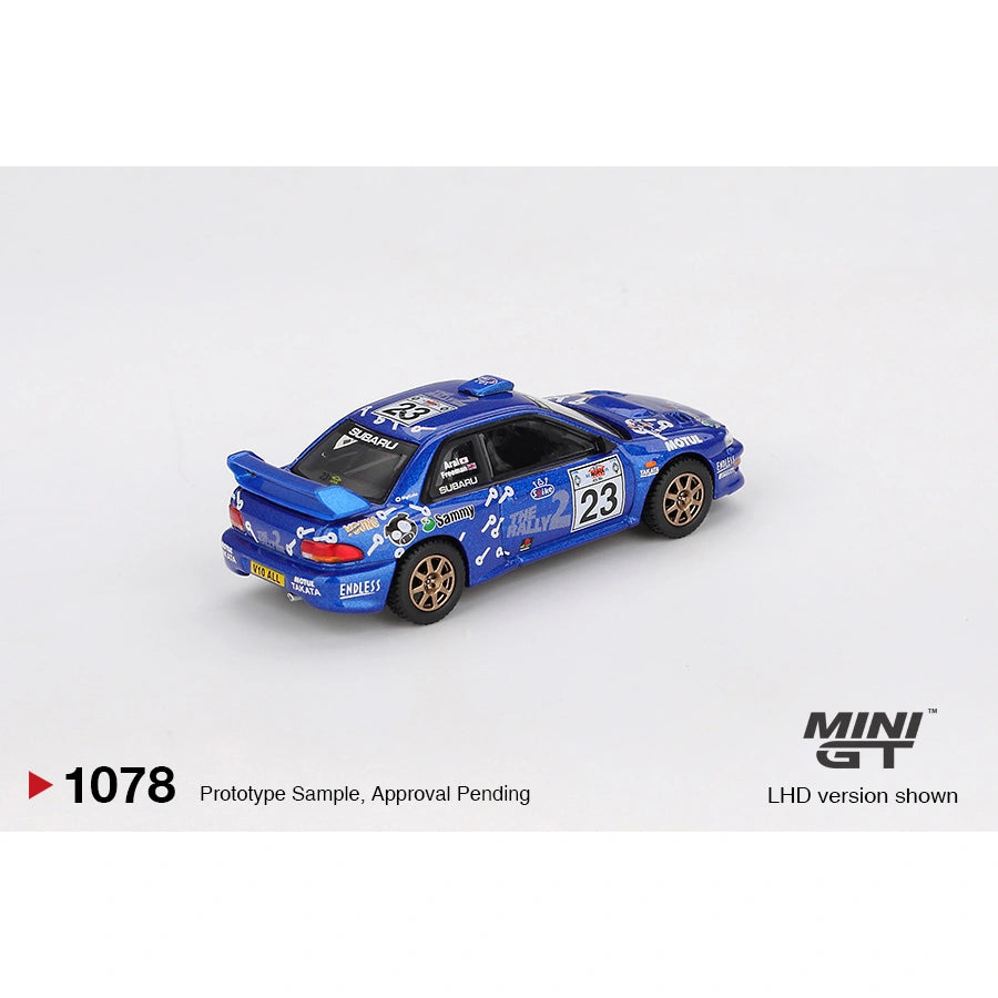 Mini GT 1:64 Subaru Impreza WRC99 #23 from the 2000 Acropolis Rally featuring rally-style livery, authentic WRC detailing, and rugged die-cast finish