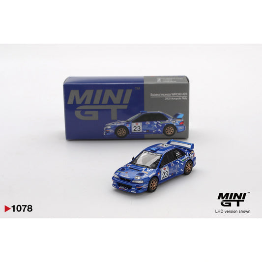 Mini GT 1:64 Subaru Impreza WRC99 #23 from the 2000 Acropolis Rally featuring rally-style livery, authentic WRC detailing, and rugged die-cast finish