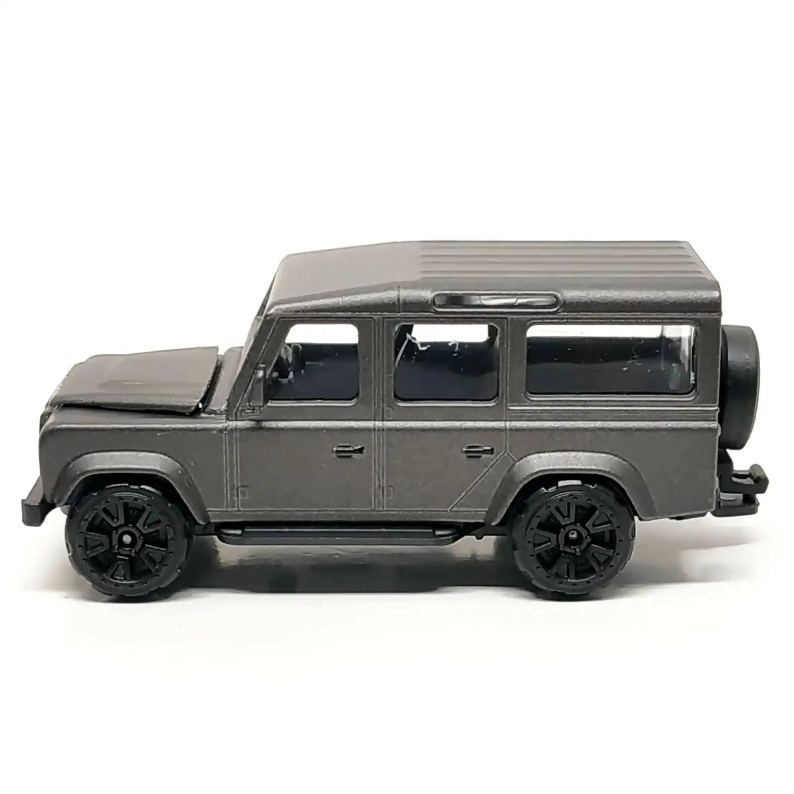 Majorette 1:64 scale Premium Cars die-cast model of the Land Rover Defender 110 in matte black, MiJo Exclusives release.